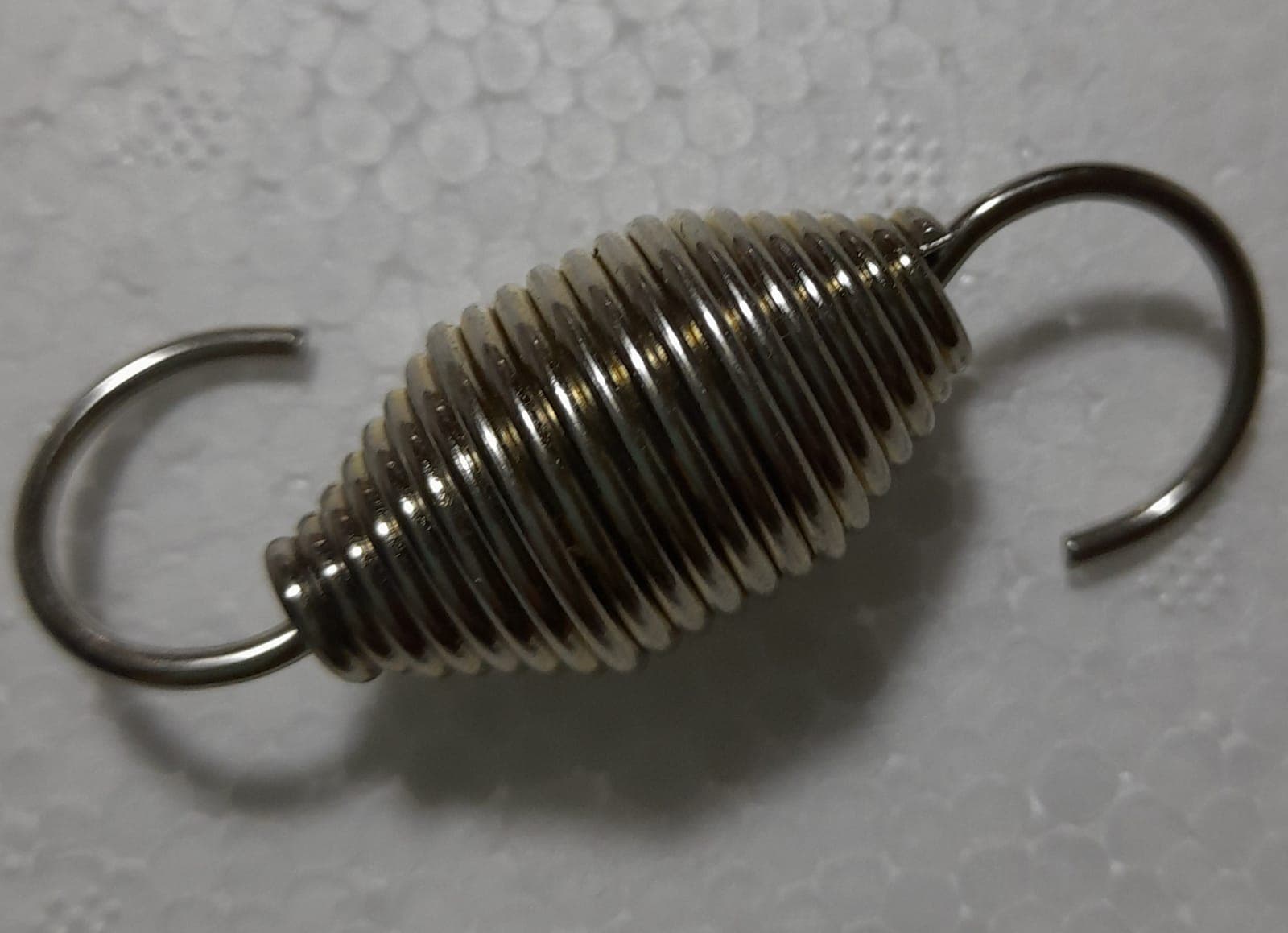 RESORTE TENSOR DE FRENO FLOW PACK ROLLO ARIBA ( CORTO)